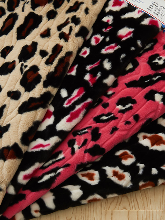 Printed rubbit fur with embossed design